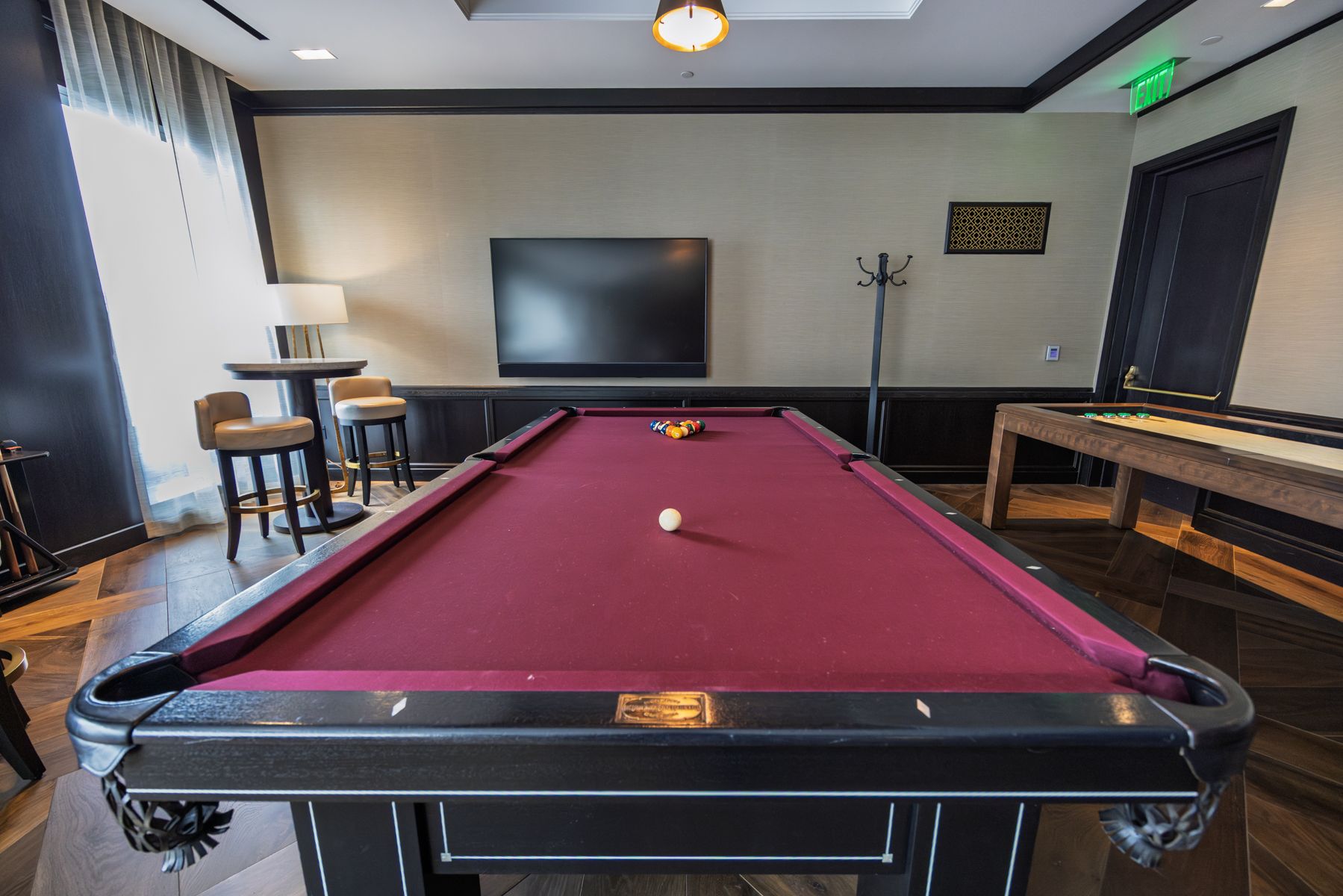 Game and entertainment room in the residents’ club at 706 Mission